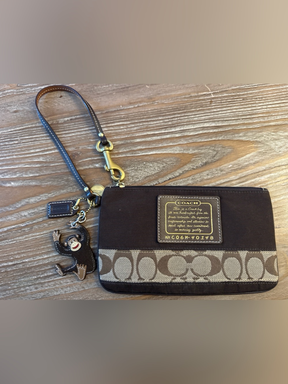 Coach Brown and Tan Signature Wristlet with Gold Accents